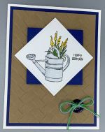 Birthday Male, Watering Can on Woven Mat